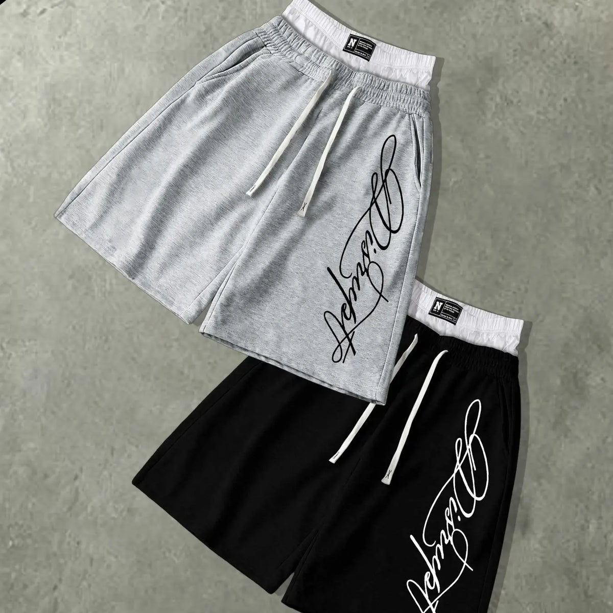 Men’s Oversized Baggy Knee Length Sweat Shorts Soft Breathable Terry Fabric Dual Layer Tartan Plaid Patchwork Waistband Elastic White Drawstring Casual Streetwear Shorts Elegant Cursive Script Signature White Letter Print Side Pocket Loose Summer Athletic