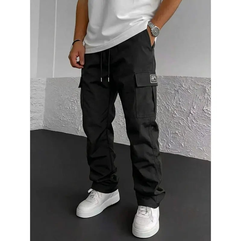 Men’s solid color tactical cargo pants — durable outdoor training pants with sport pockets; suitable for all seasons; casual streetwear pants.