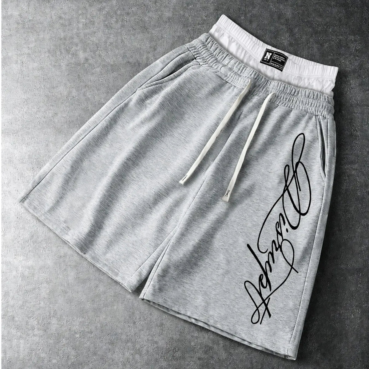 Men’s Oversized Baggy Knee Length Sweat Shorts Soft Breathable Terry Fabric Dual Layer Tartan Plaid Patchwork Waistband Elastic White Drawstring Casual Streetwear Shorts Elegant Cursive Script Signature White Letter Print Side Pocket Loose Summer Athletic
